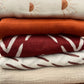 Rust Arrow Bamboo Muslin Swaddle Blanket